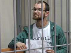 Алексей Миняйло в суде. Фото: AFP / Nikolay Korzhov